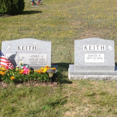 Grey Granite Slant Bevel Headstone Memorial for Single person. Praying hands design.